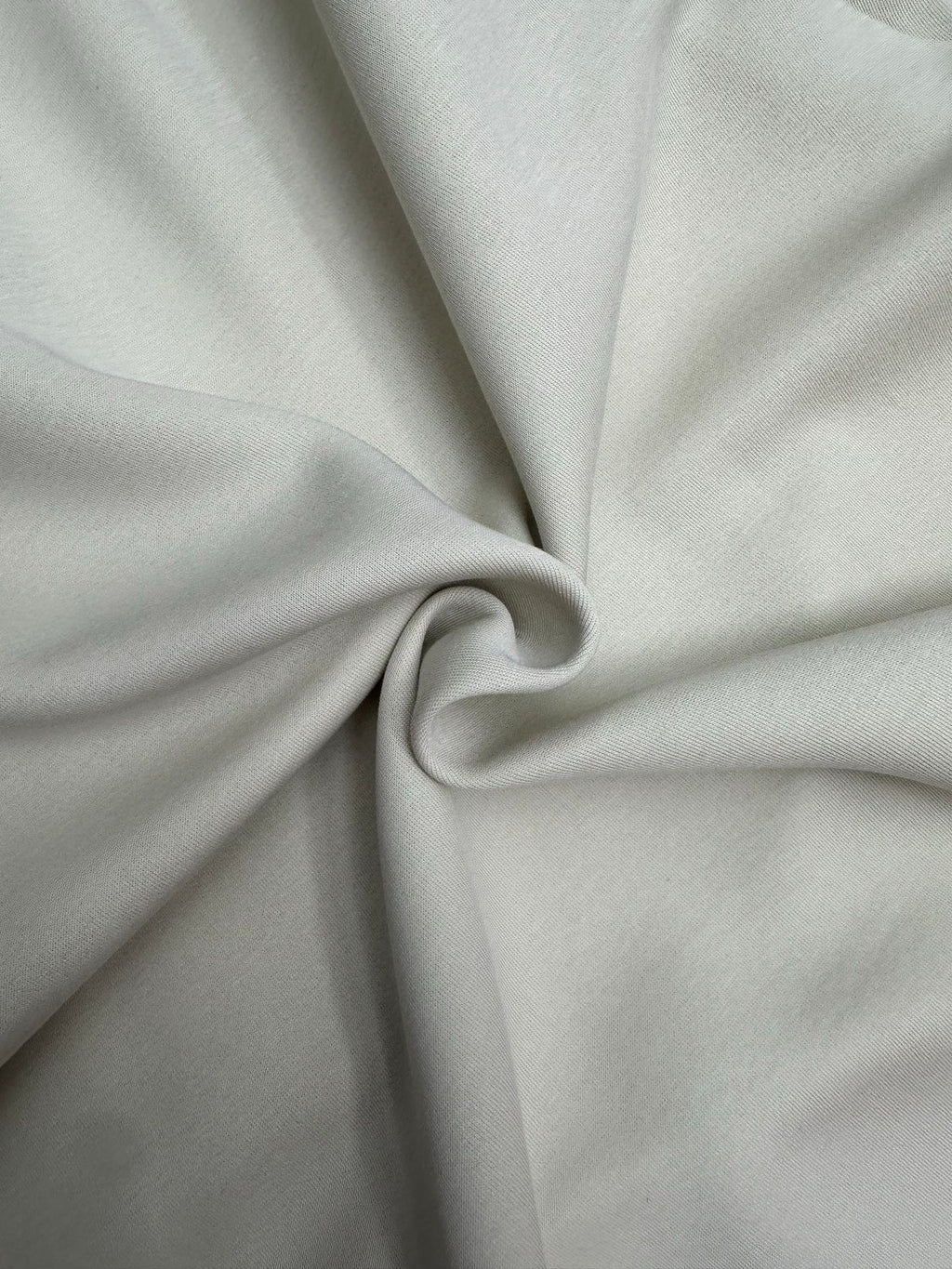 Ralph Lauren clothing, light gray fabric close-up with twisted knot