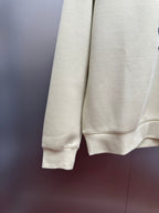 Cream sweatshirt back with ribbed hem and cuffs