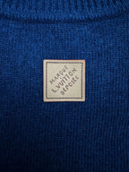 Blue knit long garment with Louis Vuitton logo patch