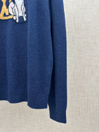 Louis Vuitton knit sweater side view, dark blue with ribbed cuff and hem