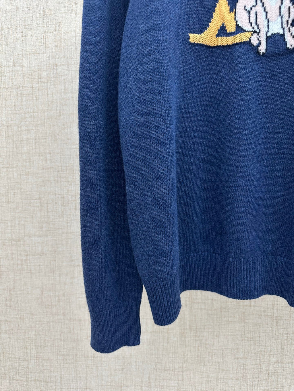 Louis Vuitton knit sweater sleeve and hem, dark blue with ribbed cuffs
