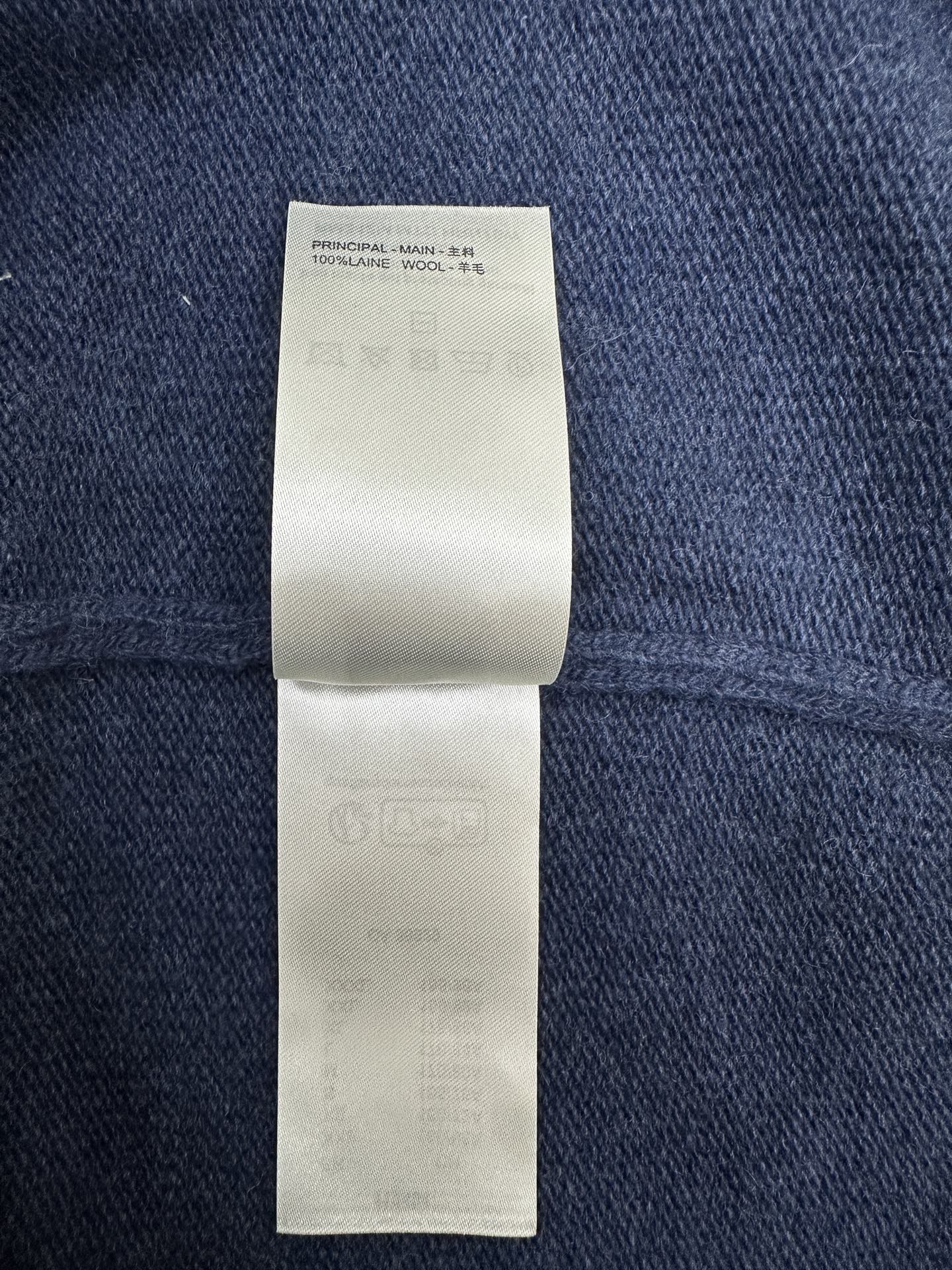 Louis Vuitton knit sweater inside label with fabric info, 100% wool