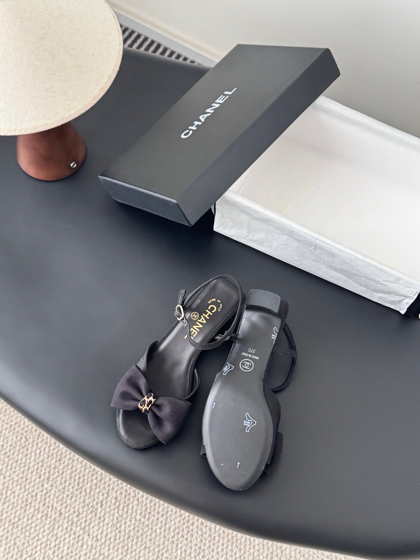 Dark slingback sandals with bow detail and small heel