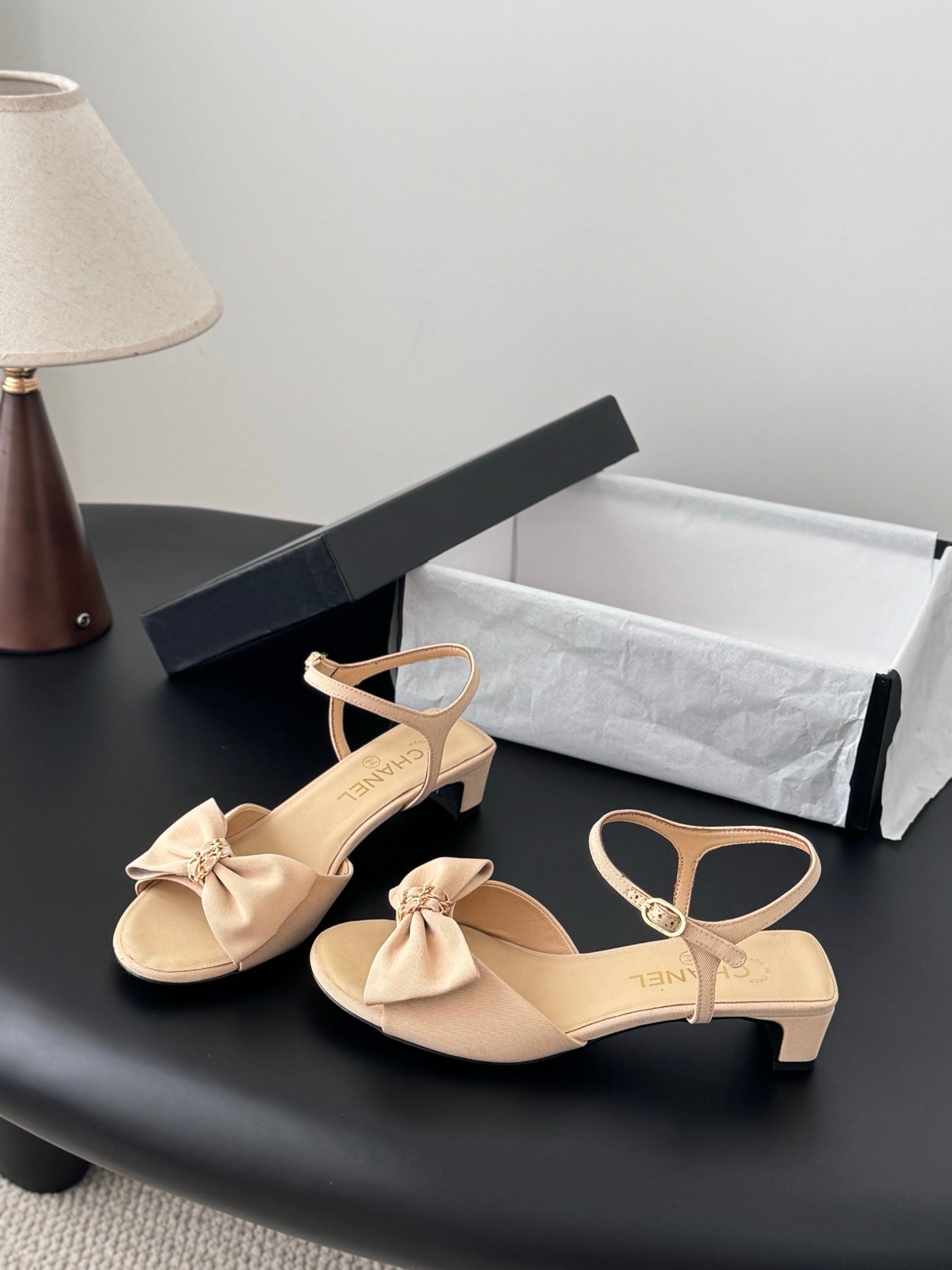 Beige slingback sandals with bow and ankle strap, low block heel