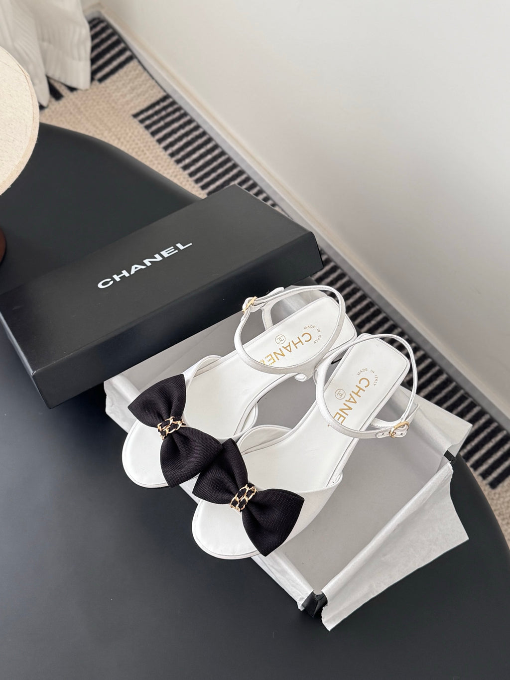 Chanel sandals with white straps and black bow, gold buckle, kitten heel