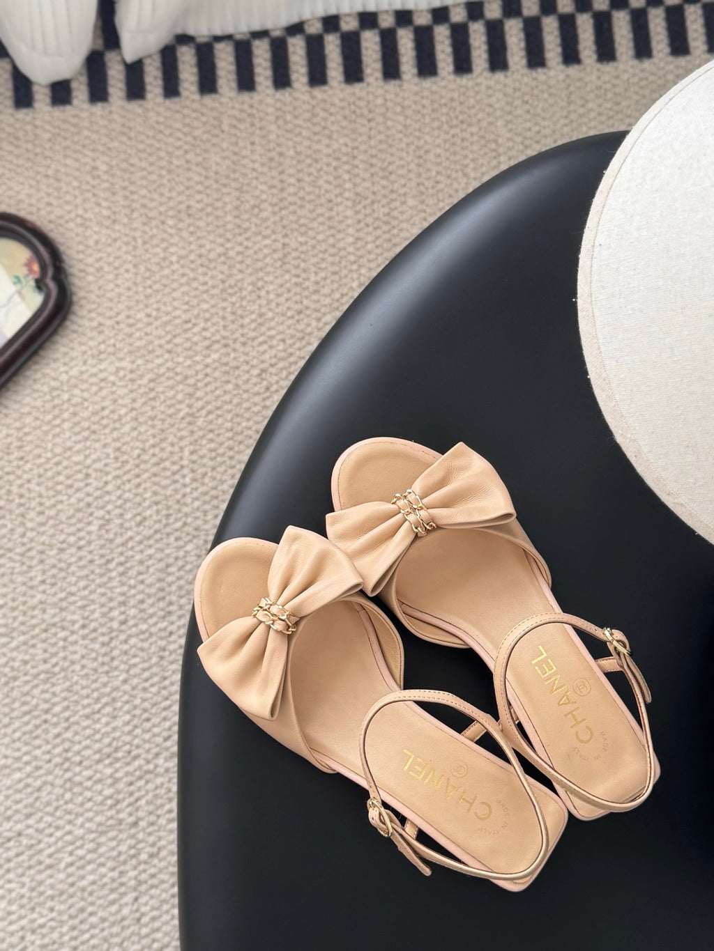 Beige slingback sandals with large bow detail and thin ankle strap