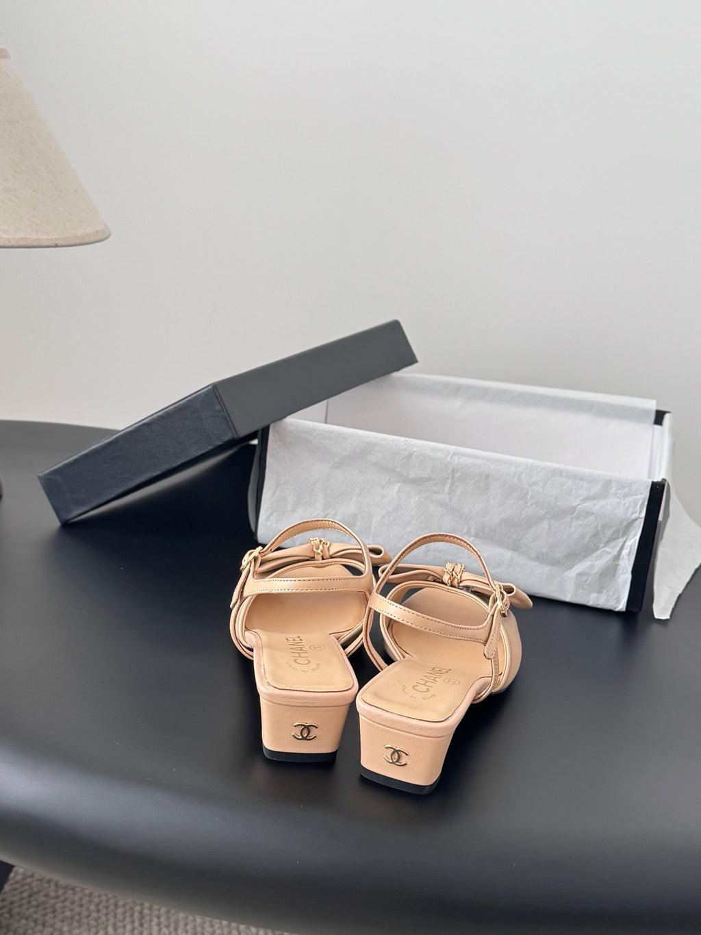 Beige bow sandals with ankle strap and low block heel