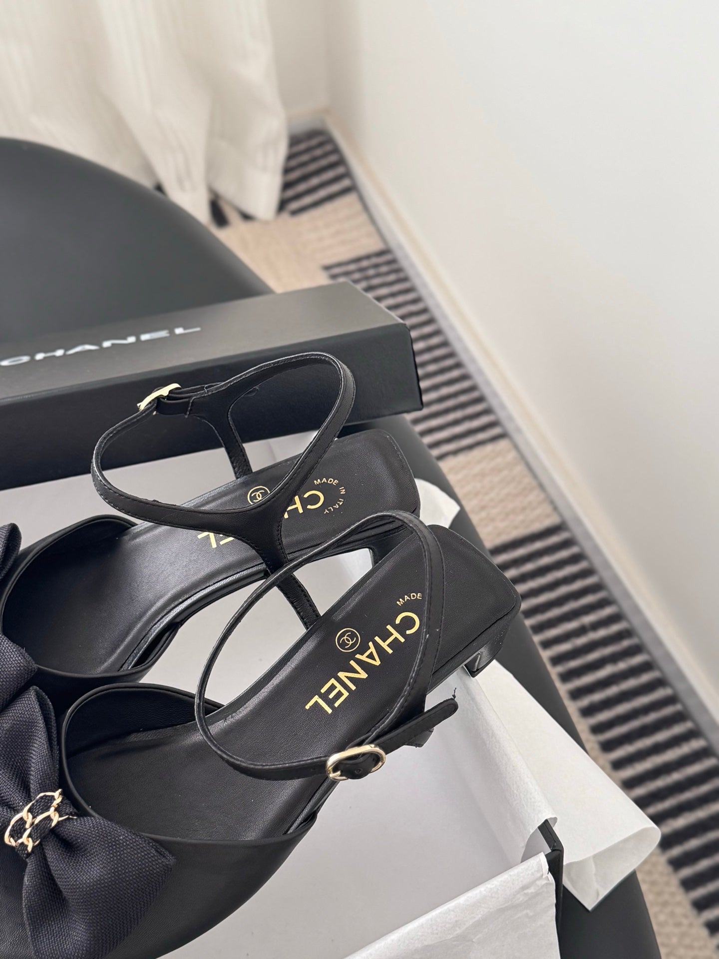 Chanel women's dark bow slingback sandals with thin straps and gold hardware