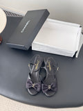 Chanel women's dark satin bow slingback sandals with gold-tone logo hardware