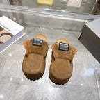 Balenciaga brown suede slip-on shoes with fur trim and chunky rubber tread sole