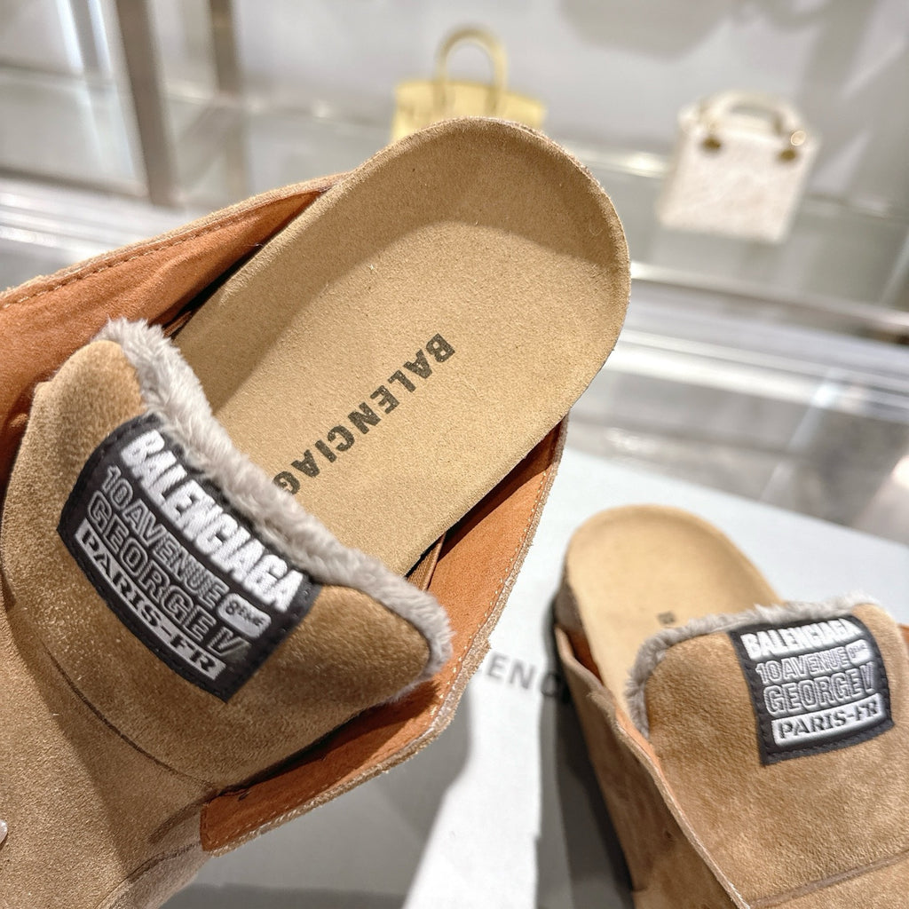 Balenciaga brown suede slip-on shoes with fur lining and logo label on the cuff