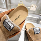 Balenciaga brown suede slip-on shoes with fur lining and logo label on the cuff