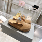 Balenciaga brown suede clogs with fur trim, black logo patch, and platform-style sole