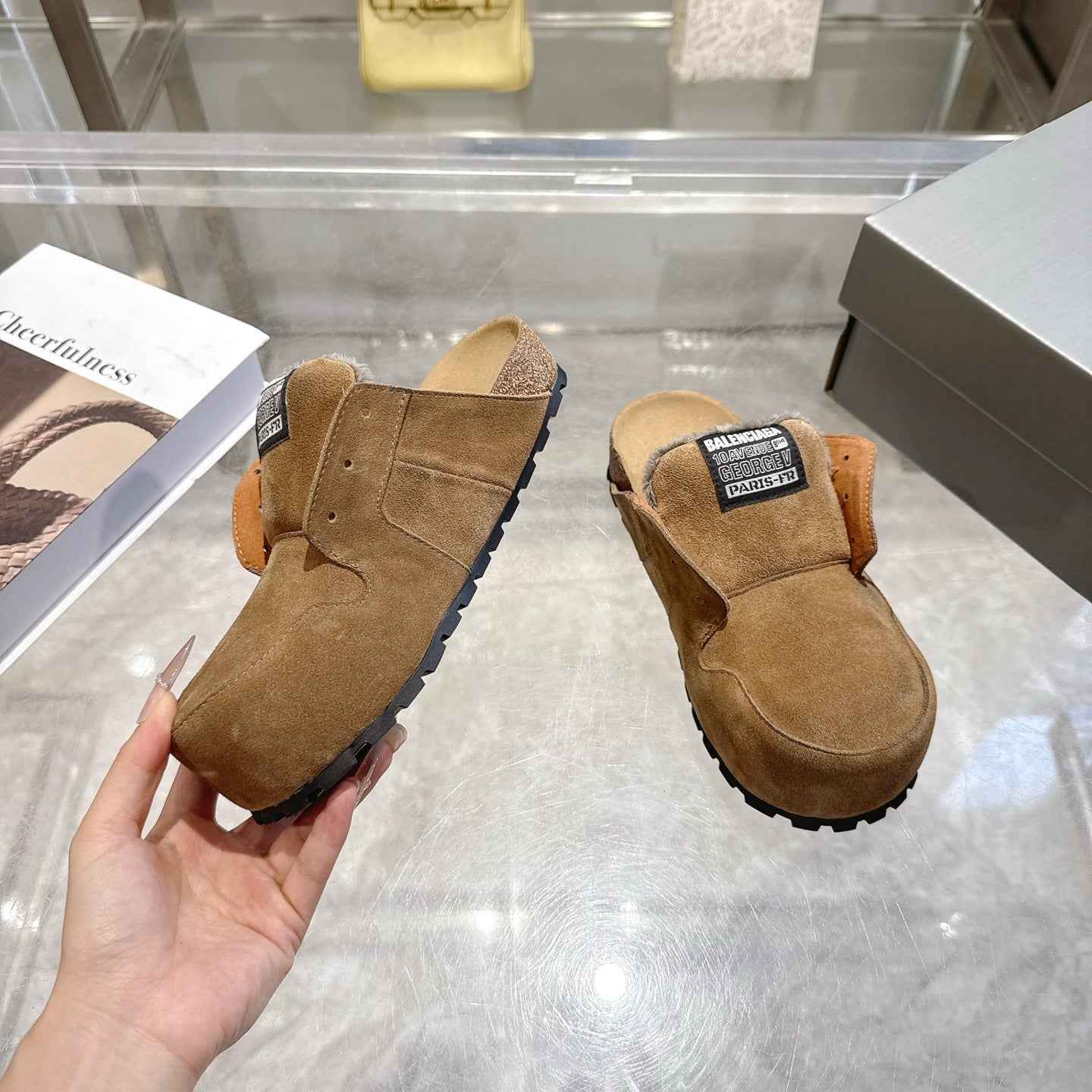 Balenciaga brown suede slip-on shoes with fur-lined collar and thick outsole tread