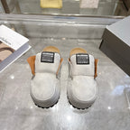 Balenciaga slip-on shoes in light gray suede, with shearling-lined collar and rubber tread sole