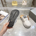 Balenciaga slip-on shoes, outsole view shows patterned tread on rubber sole and light gray upper
