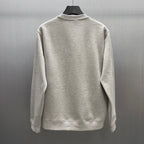 Light gray Gucci sweatshirt back view with crew neck and ribbed hem