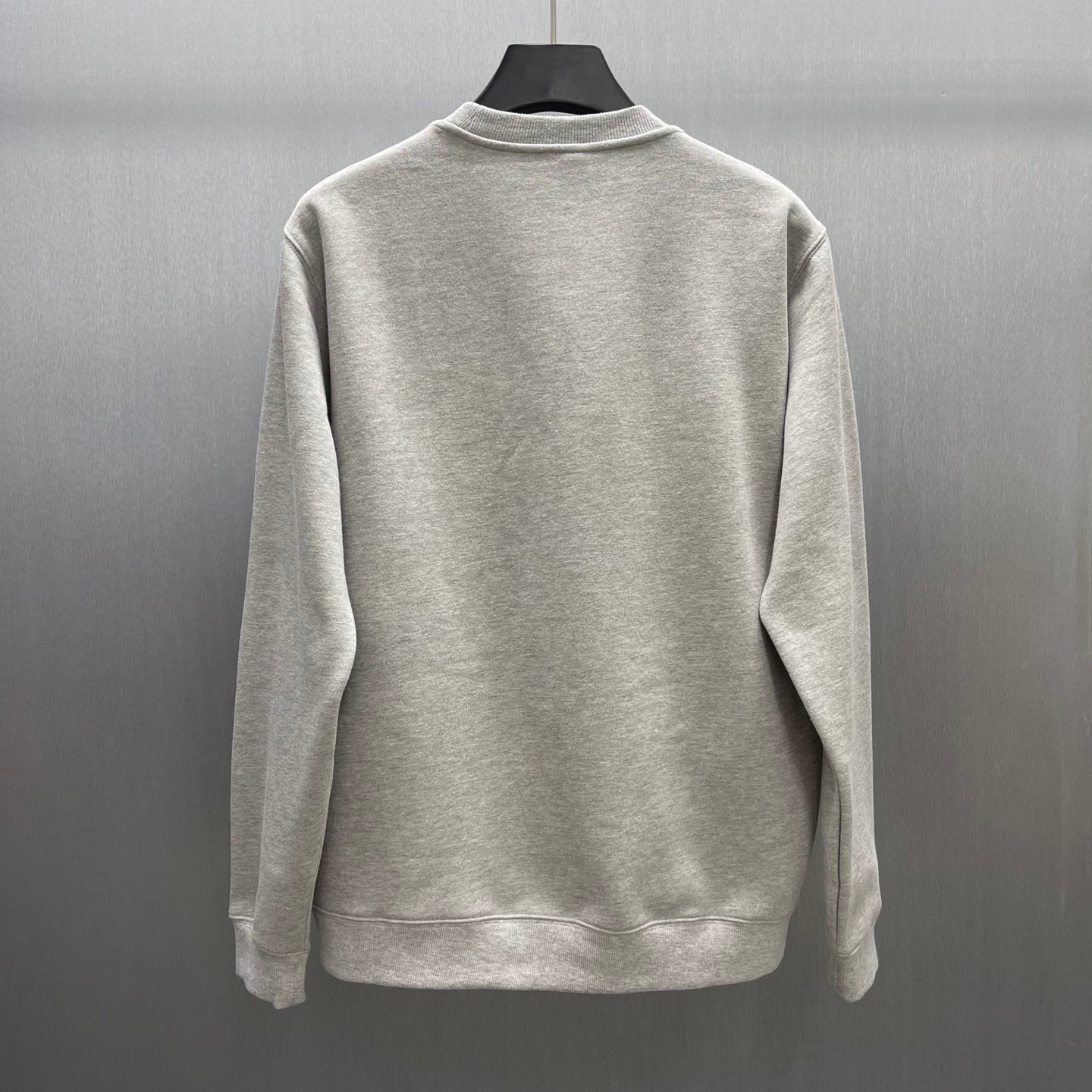 Light gray Gucci sweatshirt back view with crew neck and ribbed hem