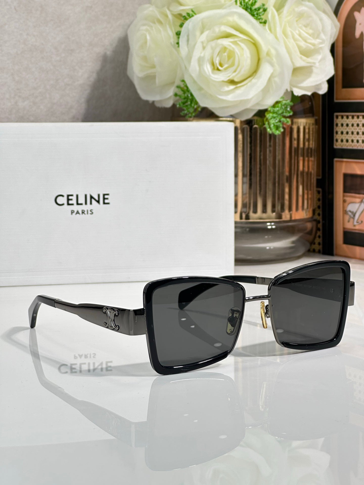 Celine square sunglasses with black frame and dark lenses