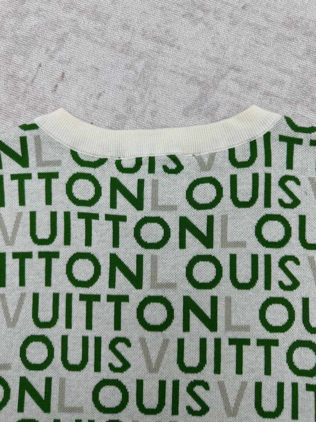 Louis Vuitton short-sleeve top front, green and white repeating monogram pattern
