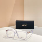 Versace eyeglasses with clear light purple rectangular frames and gold temple hardware.