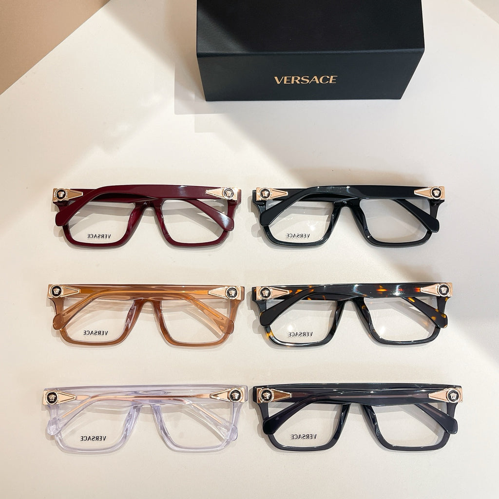 Assorted Versace eyeglasses, multiple colors: red, black, amber, and clear purple frames.