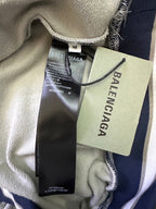Light gray hoodie interior with size M tag and Balenciaga label near collar seam