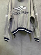 Light gray hoodie with large front Balenciaga graphic and striped waistband cuffs