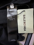 Black Balenciaga hoodie size tag and fabric label inside collar