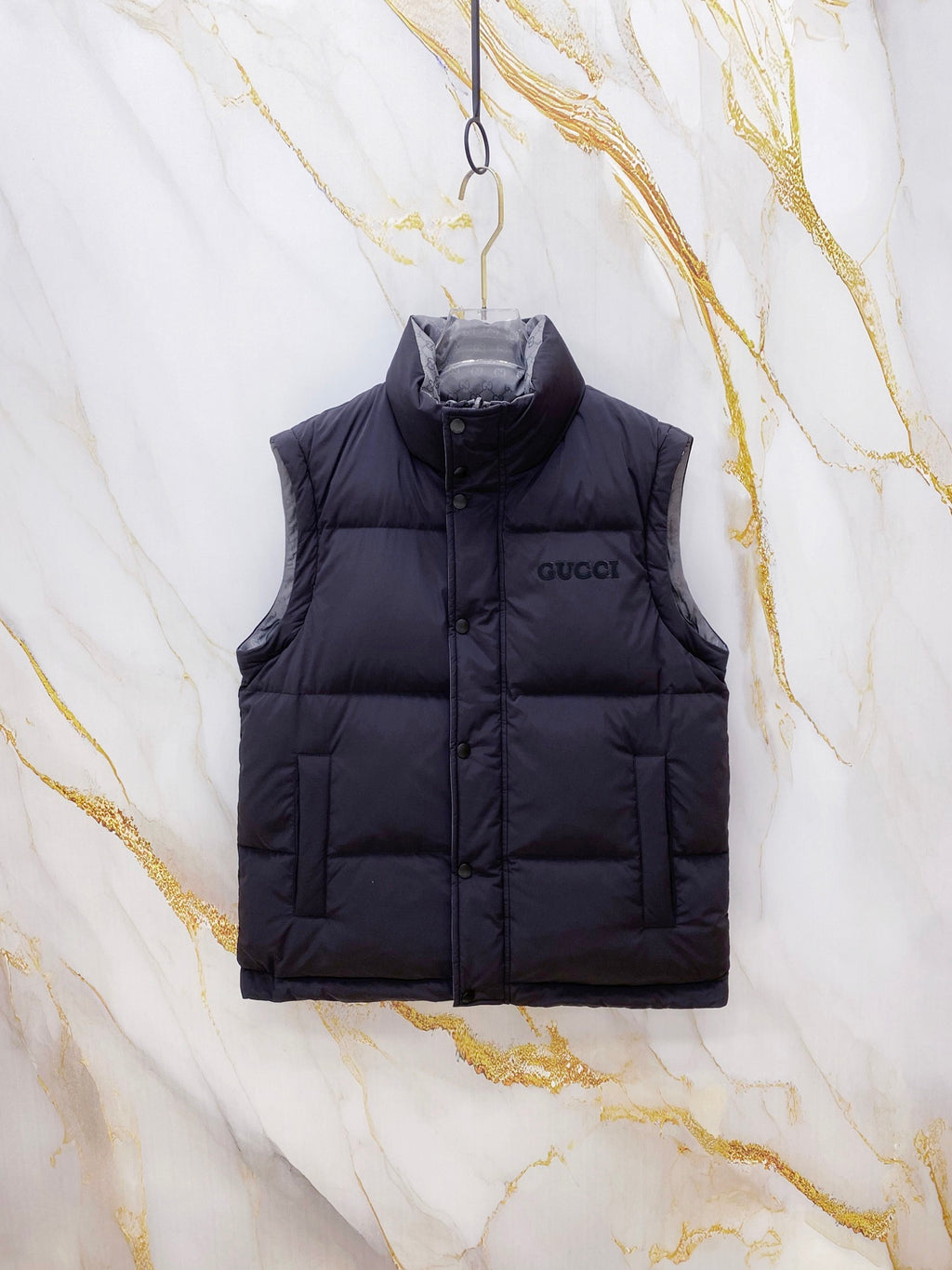 Dark Gucci puffer vest with zip front and quilted front panels