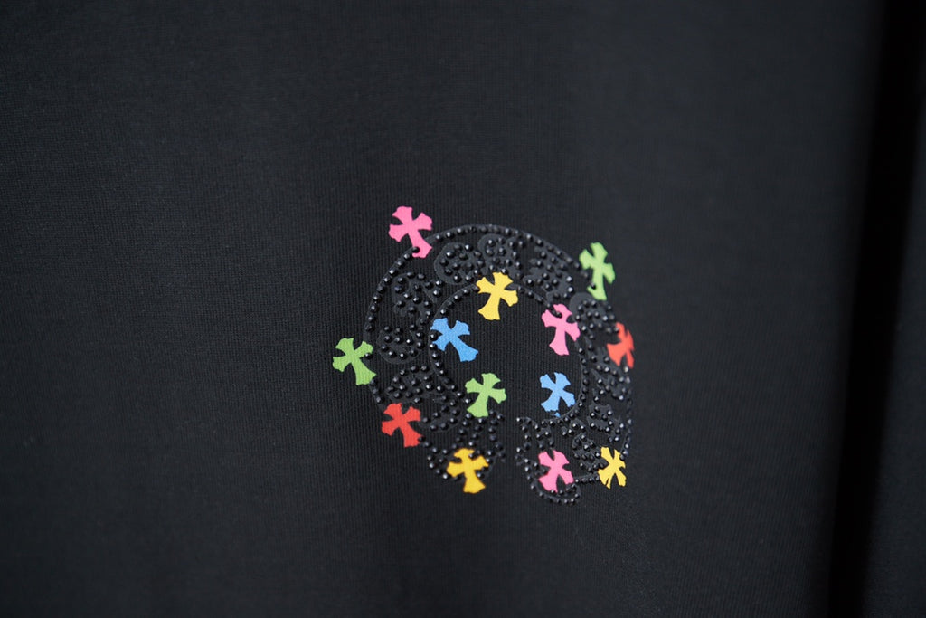 Black T-shirt with rhinestone-look circular multicolor cross-style graphic