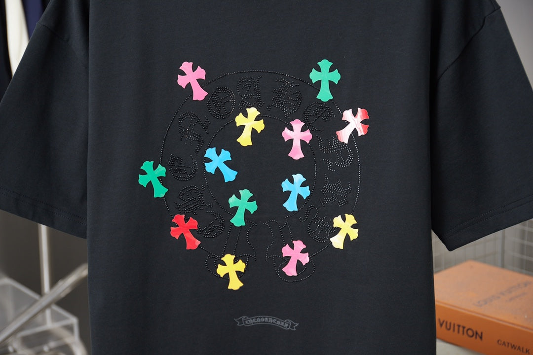 Black short-sleeve T-shirt with large rhinestone-look multicolor cross-style back graphic