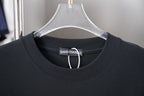 Black short-sleeve T-shirt neckline with tag and contrast inner stitching