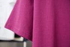 Purple short-sleeve T-shirt with curved hem and stitched sleeve edge