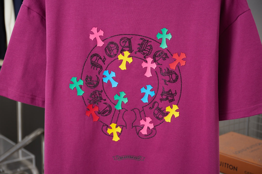 Purple short-sleeve T-shirt with large circular multicolor logo graphic on chest