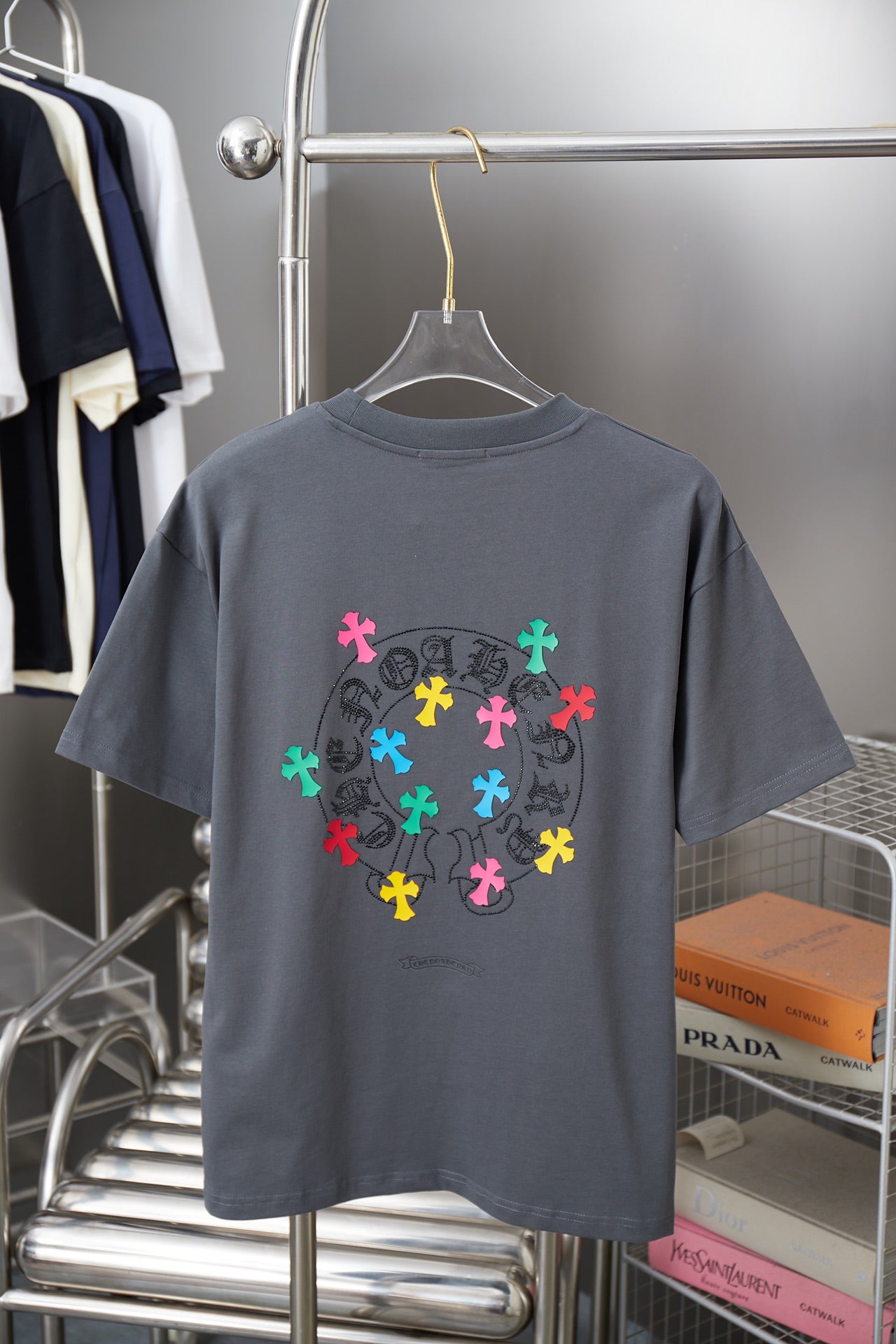 Gray crew-neck T-shirt with large circular multicolor cross graphic