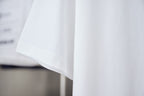 White T-shirt with short sleeve and plain fabric hem detail
