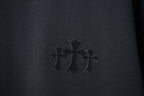 Black T-shirt chest embroidery with three cross shapes in dark thread