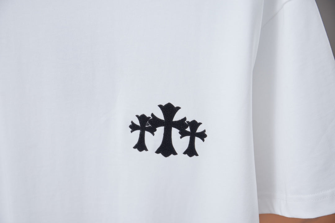 White short-sleeve T-shirt with small black graphic emblem on front