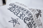 White short-sleeve T-shirt with dark star, cross, and lettering graphic at front