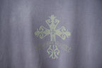 Dusty blue T-shirt with rhinestone cross and decorative motif at the upper chest