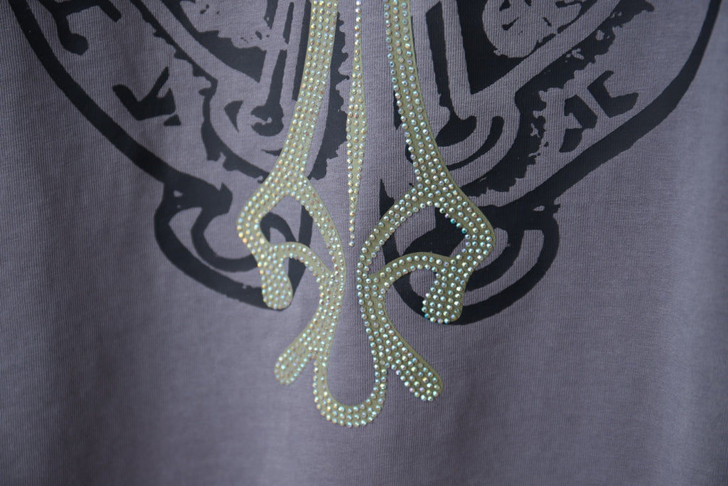 Dusty blue T-shirt rhinestone lower graphic with curving decorative details