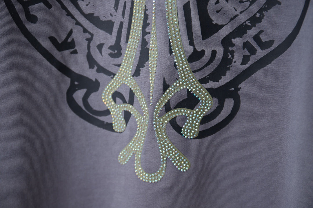 Dusty blue T-shirt rhinestone lower graphic with curving decorative details