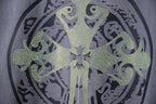 Dusty blue T-shirt front with large rhinestone circular emblem and ornate center