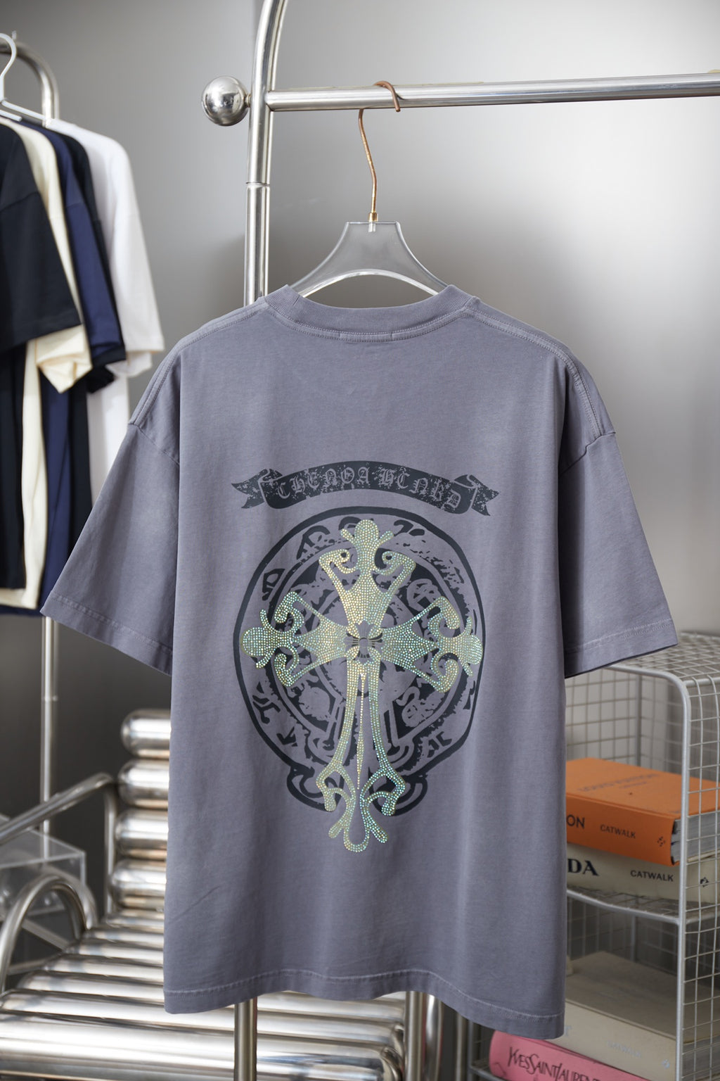 Crewneck short-sleeve T-shirt in dusty blue with large rhinestone back graphic