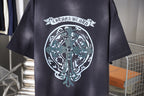 Dark navy short-sleeve T-shirt front with large circular emblem print