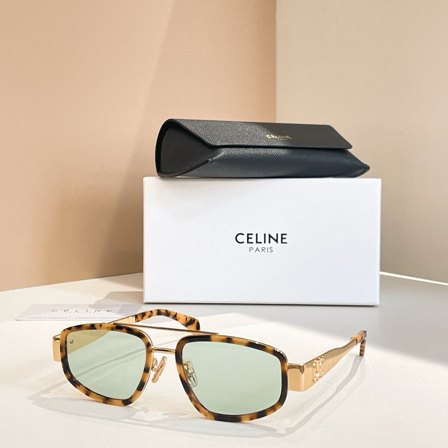 Celine sunglasses with tortoise frames and light green tinted lenses