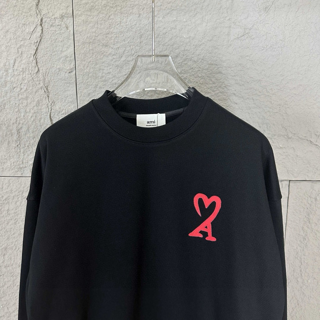 Amiri crewneck sweatshirt with red heart A logo at front neckline close view