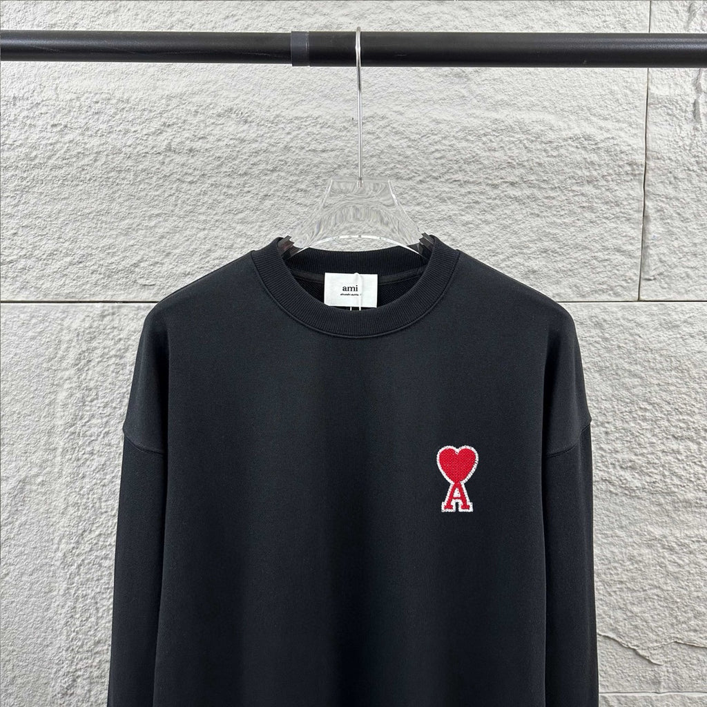 Amiri crewneck sweatshirt upper view, dark navy, red heart and A logo