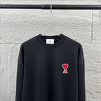 Amiri crewneck sweatshirt upper view, dark navy, red heart and A logo